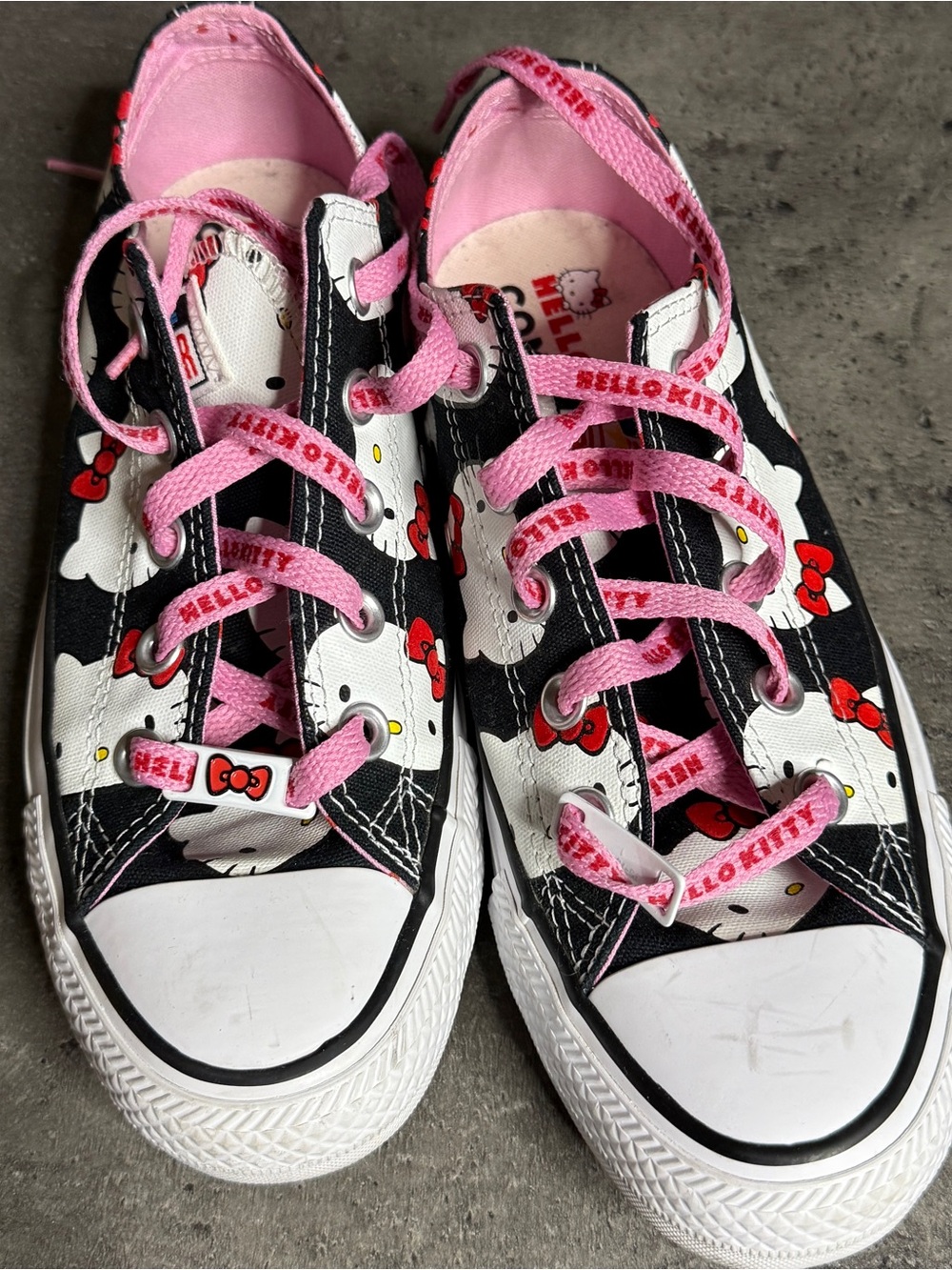 Converse All Star Hello Kitty Sneakers in black, red, prism pink, and white